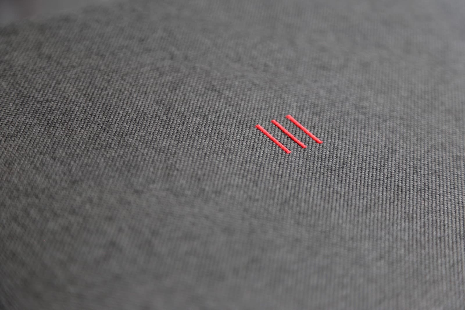 heatme Heatbars — gestickte Wärmestufen-Anzeige auf Lodenstoff